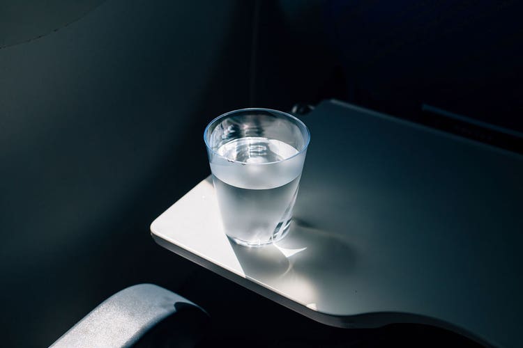 3-cup-of-water-on-a-plane
